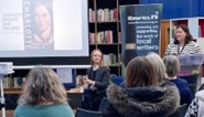 Author Martina Devlin and an audience in the library