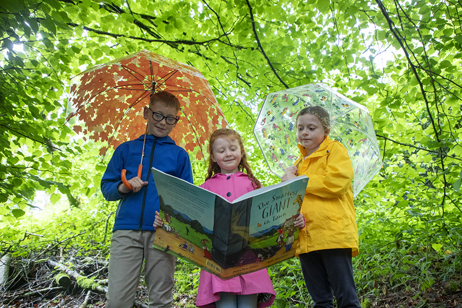 Children reading as they prepare to take part in The Big Summer Read at Libraries NI