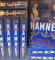 A stack of copies of Hamnet by Maggie O'Farrell