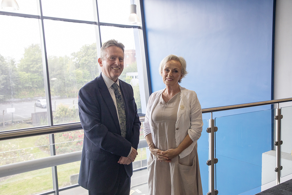 Libraries NI Chief Executive Jim O’Hagan and Commissioner for Older People for Northern Ireland Siobhan Casey at Lisburn City Library following the signing of a new three-year Memorandum of Understanding between Libraries NI and COPNI.