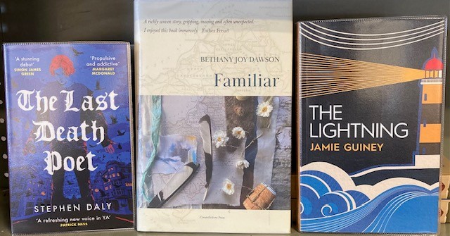 Three book titles by local authors